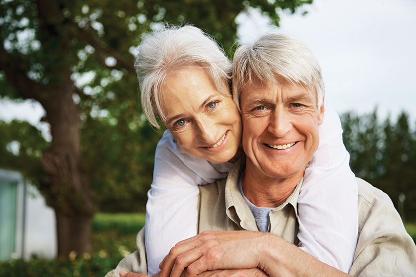 Photo of a man and woman smiling. Link to Life Stage Gift Planner Ages 60-70 Situations.